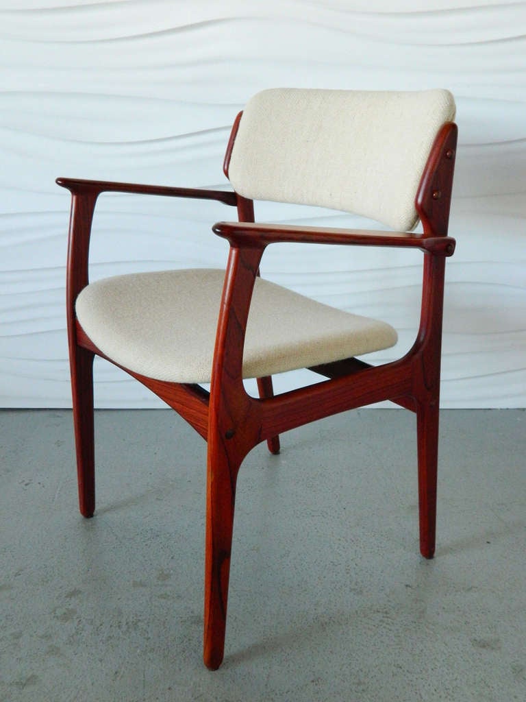 Single Eric Buck rosewood arm chair is perfect for a desk. Made in Denmark.