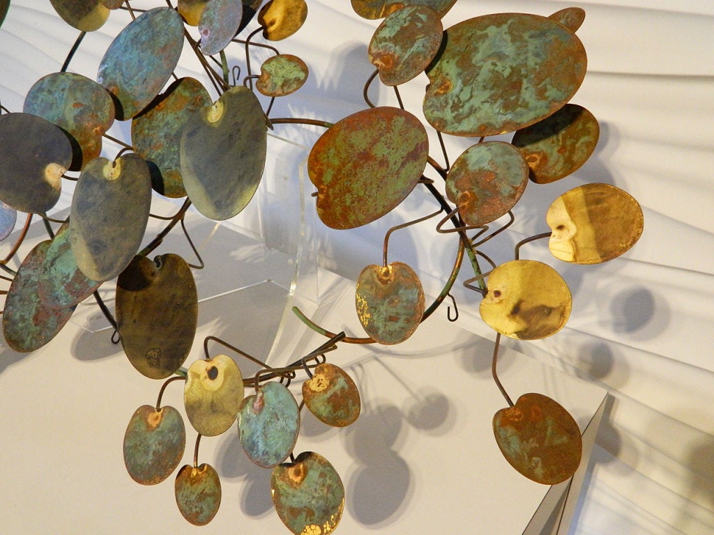 Lily pad wall sculpture by Curtis Jere. Signed C Jere and dated 1977.