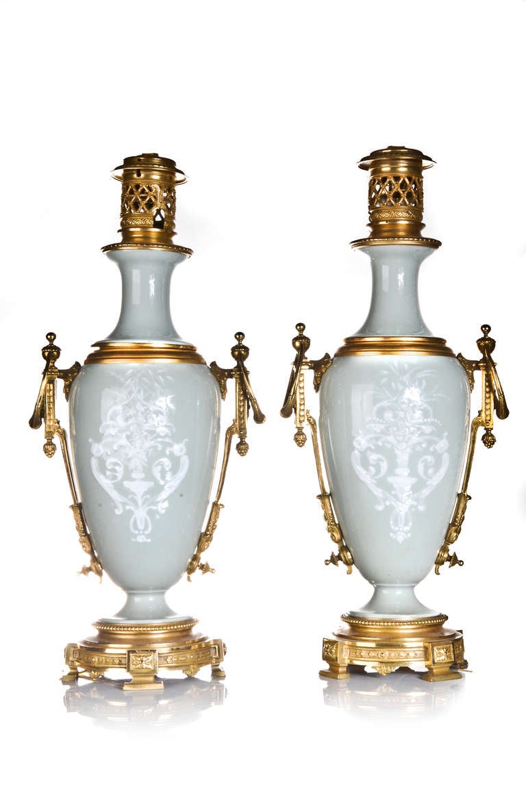Pr French Neoclassical Gilt Bronze & Celadon Pate Sur Pate Porcelain Lamps, 1860. In Good Condition For Sale In New York, NY