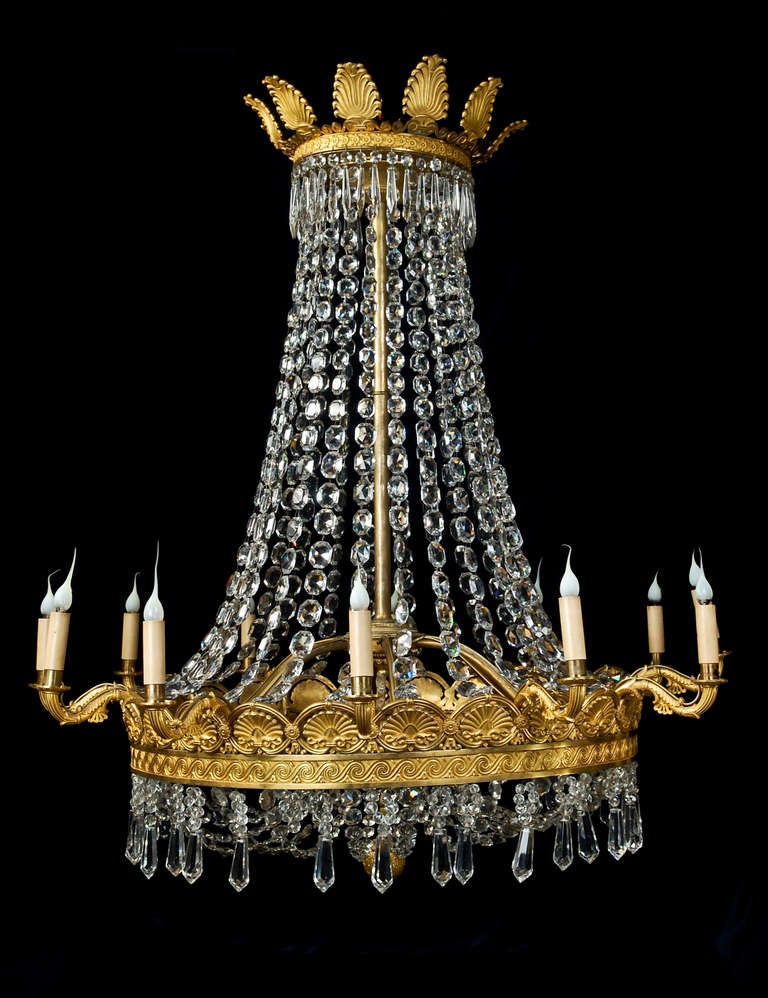 A PALATIAL & LARGE ANTIQUE PERIOD RUSSIAN NEOCLASSICAL GILT BRONZE & CUT CRYSTAL MULTI LIGHT CHANDELIER OF SUPERB WORKMANSHIP EMBELLISHED WITH FINE CUT CRYSTAL CHAINS & PRISMS,CA.1820.