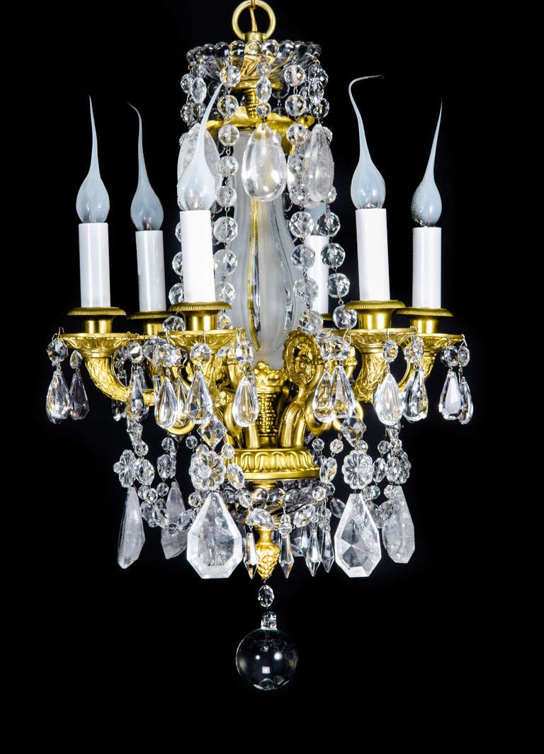 PAIR OF EXQUISITE ANTIQUE FRENCH LOUIS XVI GILT BRONZE, CUT ROCK CRYSTAL & CUT CRYSTAL CHANDELIERS OF FINE QUALITY EMBELLISHED WITH CUT ROCK CRYSTAL PRISMS AND FURTHER ADORNED WITH CRYSTAL CHAINS,19TH CENTURY.