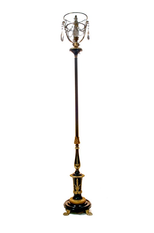 Pair of fine & tall Antique French Louis XVI Neoclassical gilt bronze, patina bronze, crystal & cut rock crystal floor lamps of great style and quality. This pair of exquisite floor lamps are embellished with cut crystal prisms & glass globes, Ca.
