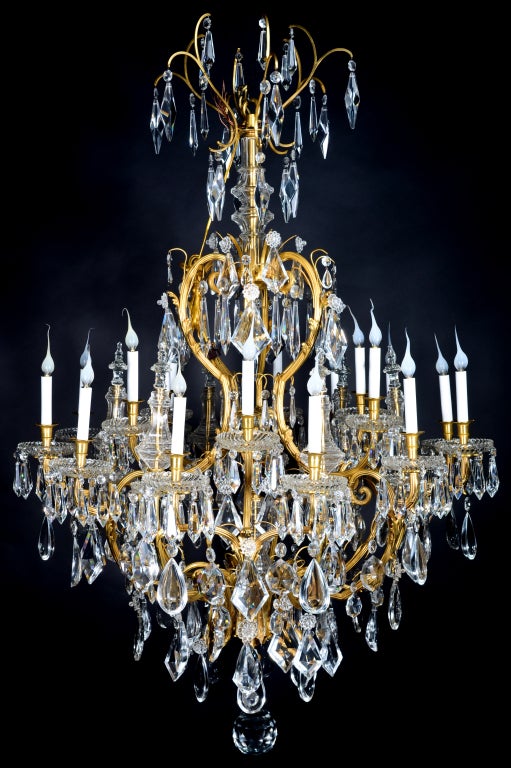 AN IMPRESSIVE & LARGE ANTIQUE FRENCH LOUIS XVI GILT BRONZE & CUT CRYSTAL SIGNED BACCARAT MUTLI LIGHT DOUBLE TIER CHANDELIER OF EXQUISITE CRAFTSMANSHIP EMBELLISHED WITH FINE LARGE CUT CRYSTAL PRISMS & FURTHER ADORNED WITH MANY LARGE CUT CRYSTAL