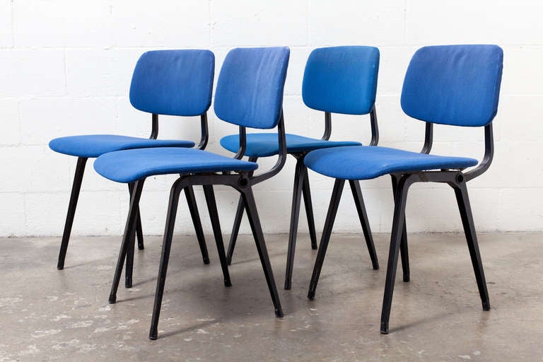 Set of 4 Original Condition Royal Blue Upholstered REVOLT chairs. Black Enameled Folded Sheet Metal designed in 1958. Set Price