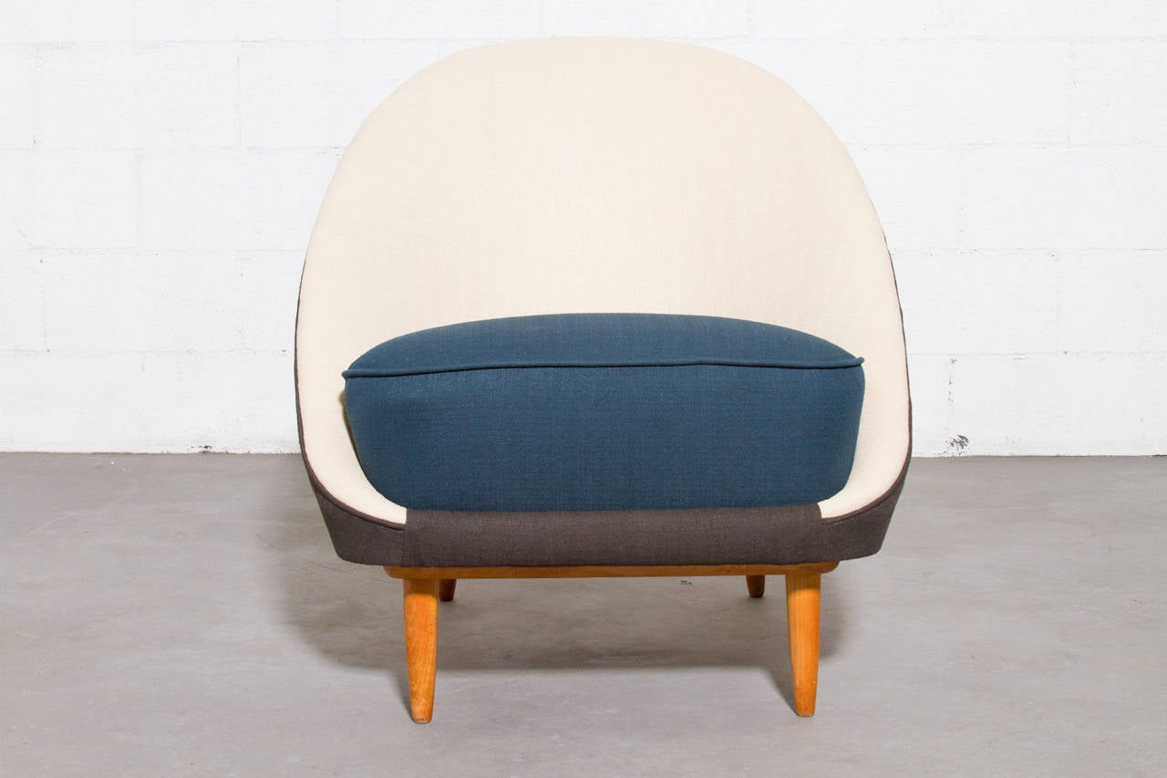 Theo Ruth for Artifort Model 115 Chair, 1959. Newly Upholstered Three-Toned Fabric with Natural Beech Wood Frame. Frame is in Original Condition with Some Wear Consistent with Age and Use.

Theo Ruth was an interior and furniture designer whose