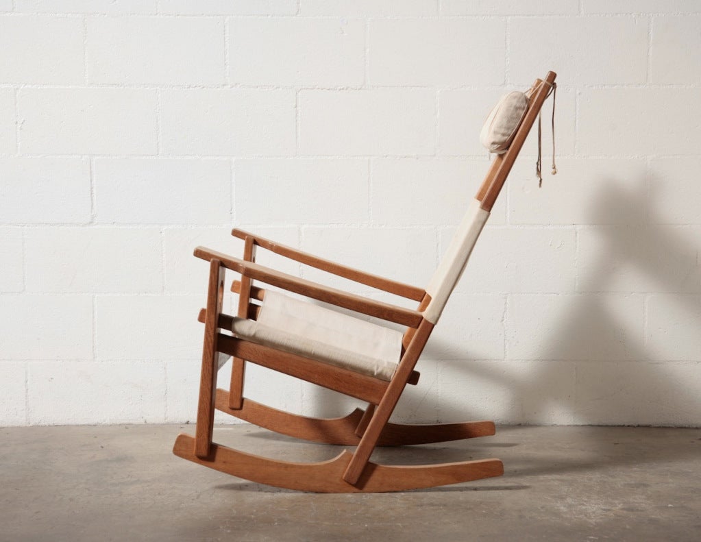 Simple Wide Oak Rocking Chair with Heavy Canvas Upholstery and Head Bolster.