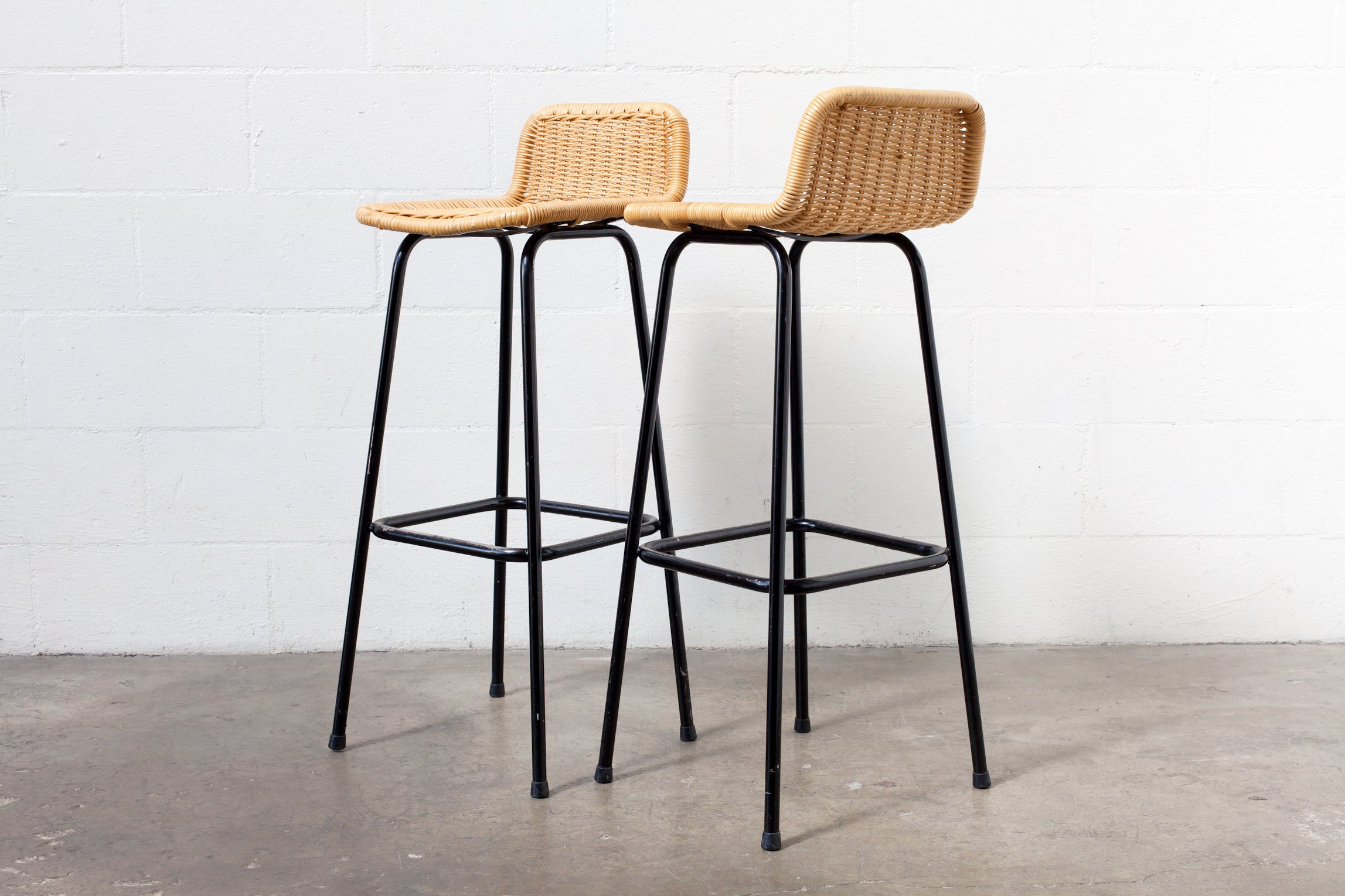 PAIR OF CHARLOTTE PERRIAND STYLE WICKER BAR STOOLS