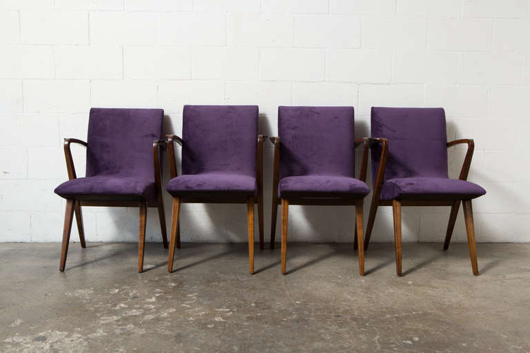 Danish Modern Arm Chairs with Newly Refinished Organic Frame and New Upholstery. One of the chairs is 1