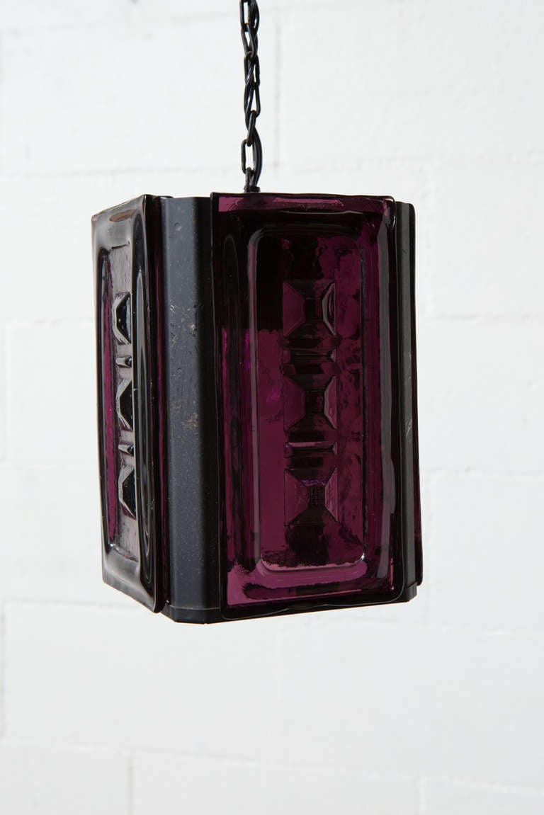 Heavy Black Steel Framed Pendant Lamp with Thick Molded Amethyst Glass Panels Hanging from a Chain