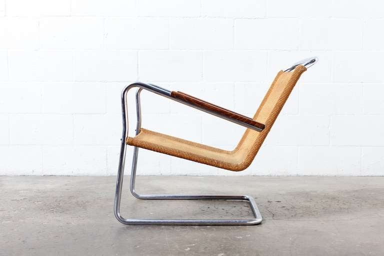 1930's Designed Lounge Chair with Sisal Upholstery (Woven Grass Rope) and Tubular Chrome Frame with Ebonized Wood Arm Rests. Original Condition.