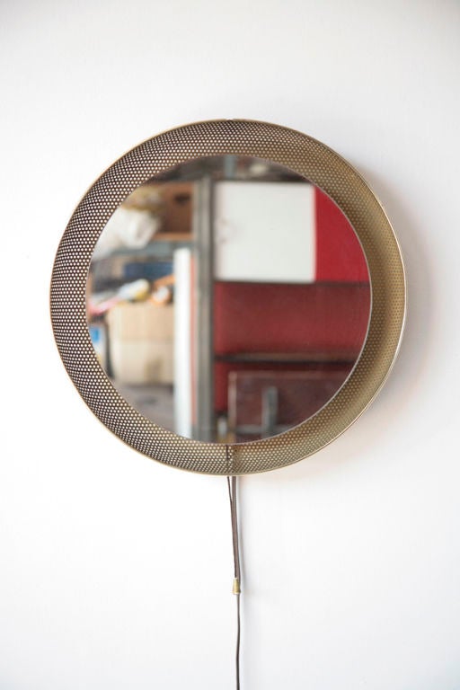 Mathieu Mategot Style perforated Metal Circular back lit Wall Mirror with Pull String Switch By Artimeta Soest. Priced Individually.