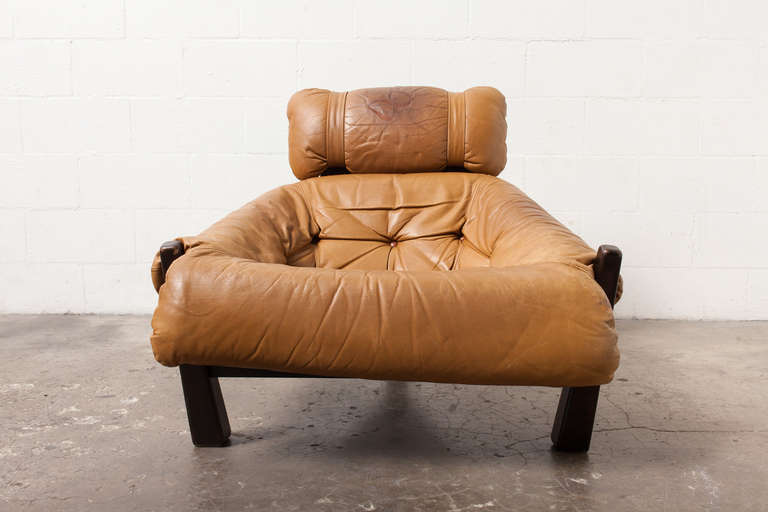 Gerard van den Berg Lounge Chair for Montis, 1970-72. Camel Colored Leather with Great Patina and Heavy Wenge Tripod Base Frame.