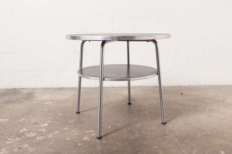 Industrial Two Tiered Tubular Metal Frame with Brushed Aluminum Edging and Black Linoleum Table Tops. Great Entry Table.