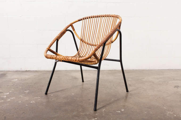 Elegant Bamboo Bucket Chair with High Enameled Metal Frame. Visible wear.