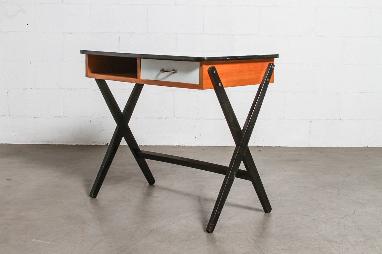 Great Little Writing Desk in Birch wood with Ebonized X-Base, Baby Blue Colored Drawer and Formica Top. Coen de Vries is among the Dutch pioneers of industrial design Many of Coen de Vries' practical designs where recommended by Goed Wonen (Good