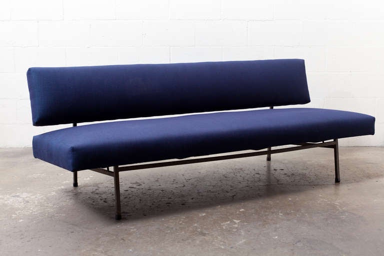 Newly Re-Upholstered Royal Blue Bench Slyle Sofa with Grey Metal Frame. The Seat Bench Pulls out to Make Room for a Sleeper...