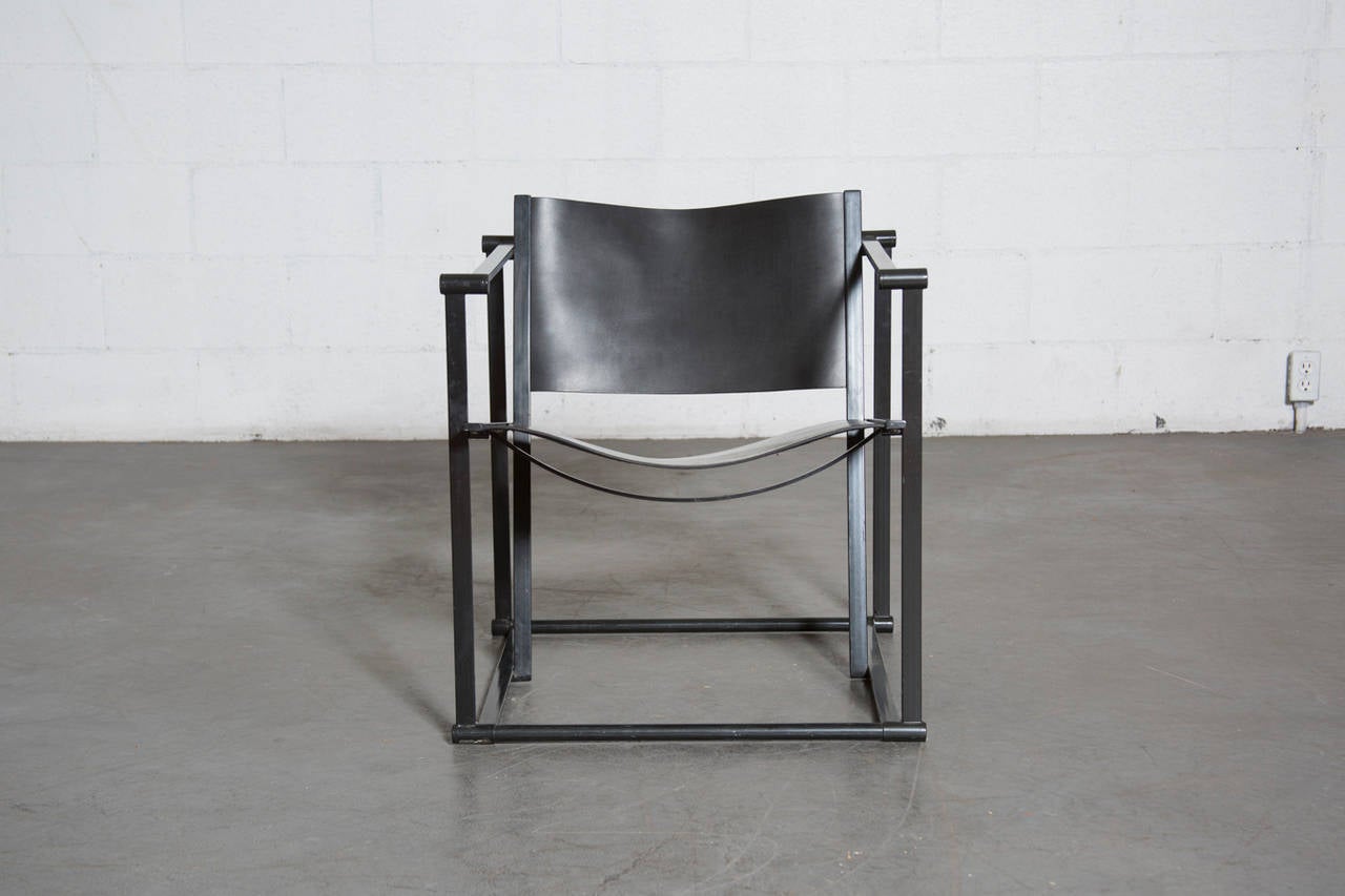 UMS Pastoe FM60 cubic lounge chairs with enameled black frames, designed in 1980 by Radboud Van Beekum. Frames are in original condition with some wear to enamel, brand new black leather seat and back. Set price.
