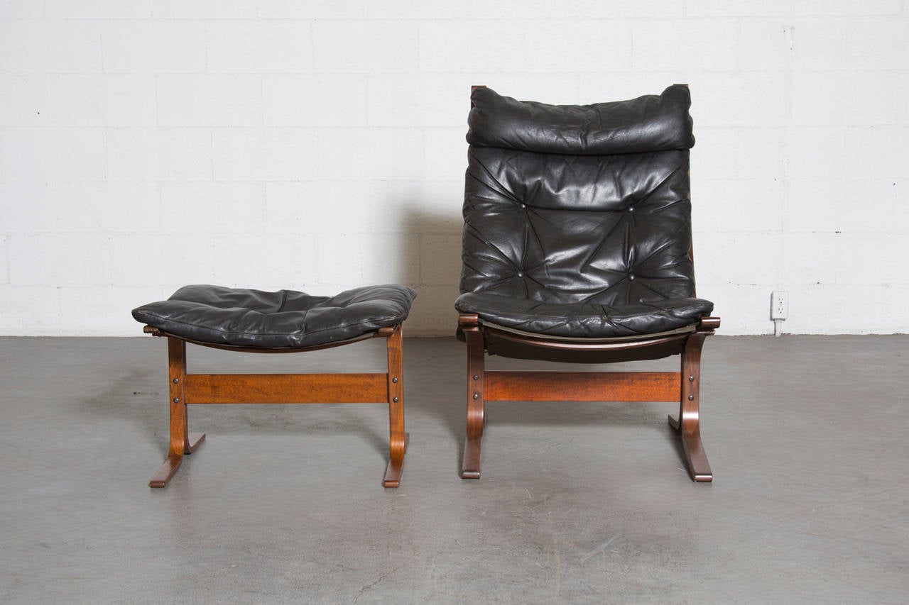 Black leather cushions with bent plywood frame in original condition, well used and loved. Retains Westnofa tag. Set price.