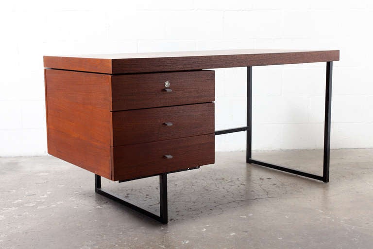 Great Little Modern Desk with a Wide Top, Black Modernist Frame and Brushed Chrome Drawer Pulls.