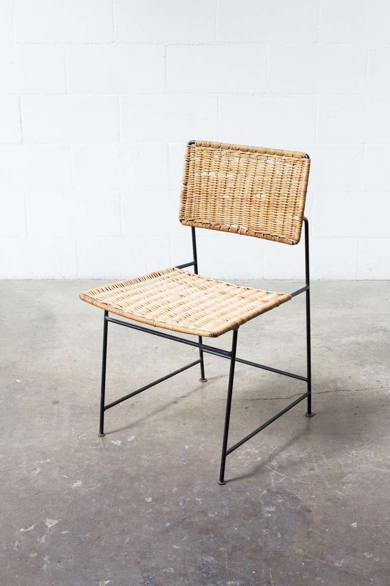 Rare set of 'SW 88' chair, designed in 1954.  Enameled Black Metal and cane work with Visible wear and loss to the wicker.