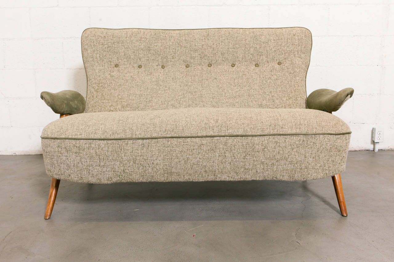 Theo Ruth for Artifort Two-Seater Sofa and Two Matching Lounge Chairs. Legs are in Blonde Wood with Original Green Tweed Upholstery, Leather Armrests on sofa and vinyl armrests on chairs. Original Condition Frames with some Natural Wear to Finish.