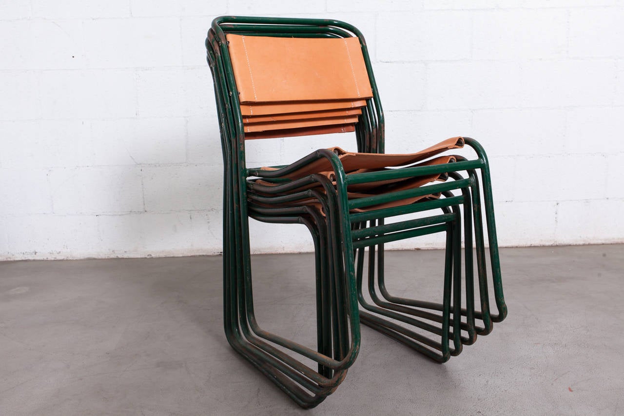 Industrial Stacking Forest Green Enameled Tubular Frame with new Natural Tan Leather Seat and Back. Very Minimal Linear Design - Green Frame is Original with signs of wear and some rust in a Few Areas.