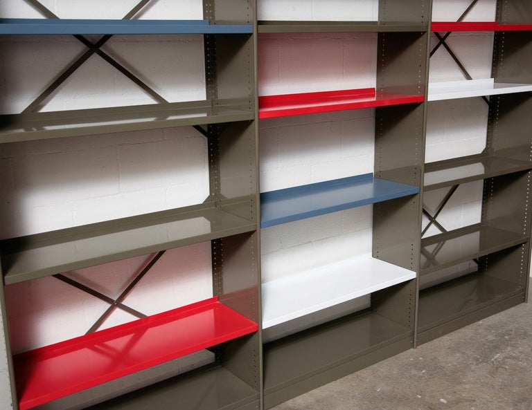 Beautiful 3 Section Bookshelf newly powder coated Army Green Sheet Metal with Multi-color Shelves. Excellent Condtion.