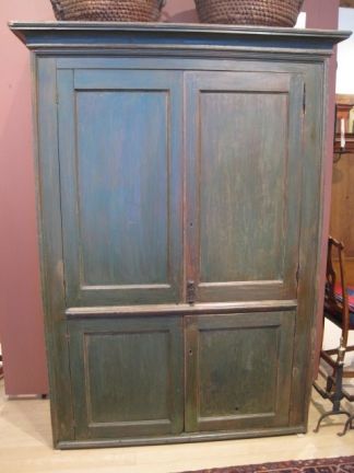 Early Hudson Valley cupboard in original green and salmon paint, hand-forged rose-headed nails, nice cornice, attractive picture frame molding, hand-forged interior 