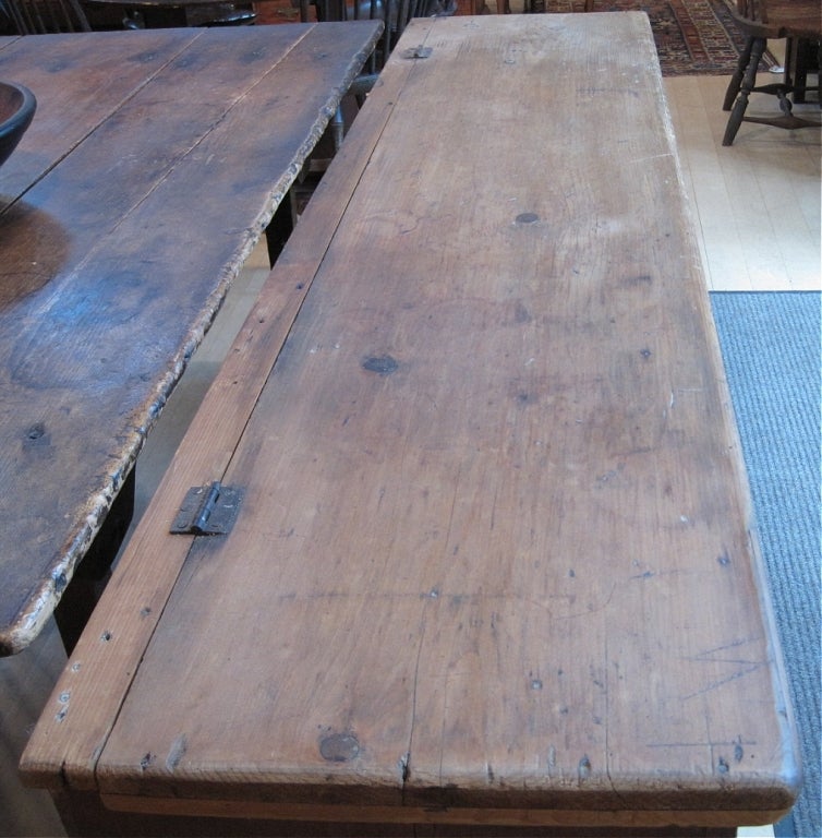 Painted grain bin, pine, with original red paint. The grain bin has a scrubbed top, high “V” shaped bootjack ends and three compartments inside. It dates from circa 1820, and was found in Kingston, NY, in the heart of the Hudson Valley. The grain