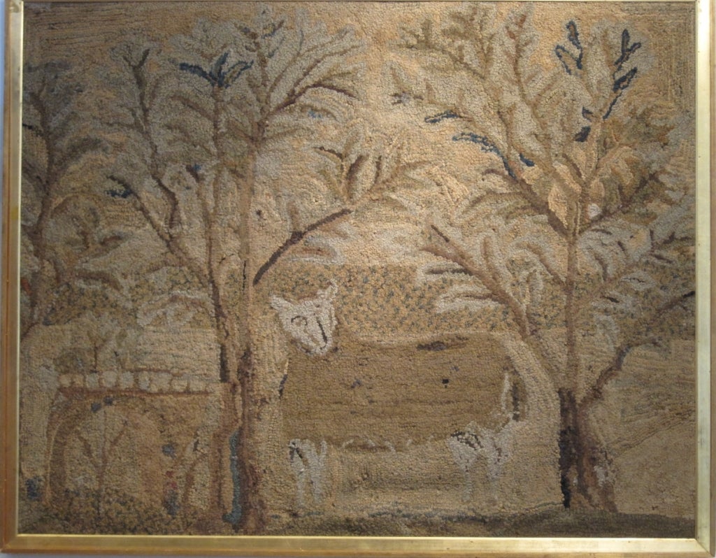 Early folk art hooked rug depicting a sheep in a pastoral setting, with trees, birds, a stone archway and a field. The rug is nicely framed and makes for a very attractive wall hanging. 19th Century, New England origin.