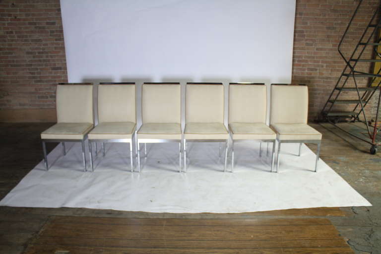 Set of six chrome dining chairs by Milo Baughman for Design Institute of America (D.I.A.) reupholstered in a cream/camel color fabric.