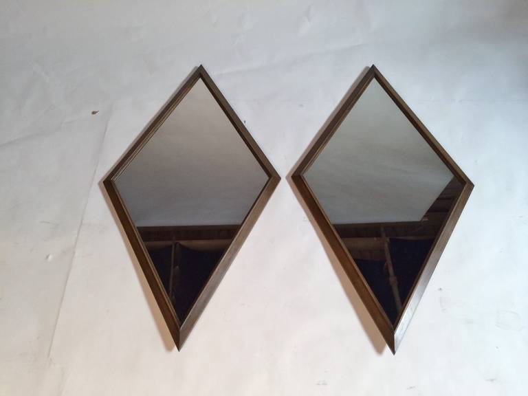 Pair of Mid-Century walnut frame diamond shape mirrors. Ready to hang.