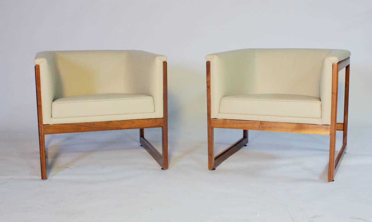 1970s Milo Baughman cube shape club chairs in freshly restored walnut frame and newly upholstered bone color leather.