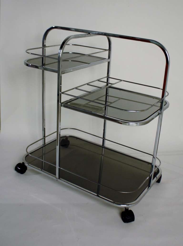 Three-Tier Mid Century / Art Deco / Machine Age chrome bar cart with smoked glass on castors