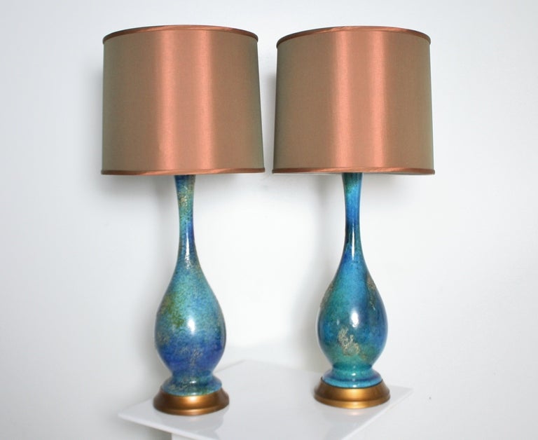 Stunning pair of mid century bulbous lamps in blue and copper with new copper-color sateen drum shades.  