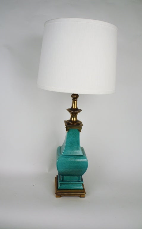Stunning Asian style porcelain crackle glaze lamp in turquoise and brass.  shade not included