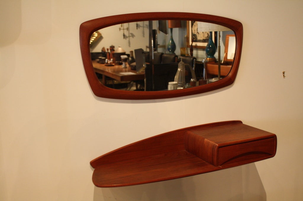 3-piece teak single-drawer and shelf wall console, mirror and bench with a black leather leather cushion made in Norway c.1950s