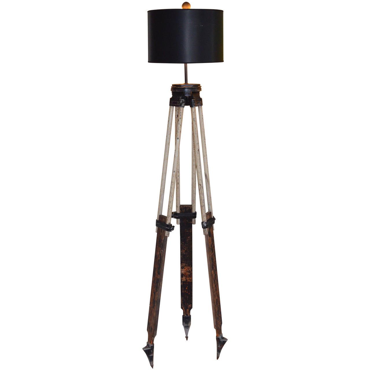 Floor lamp from black-and-white surveyor
s tripod