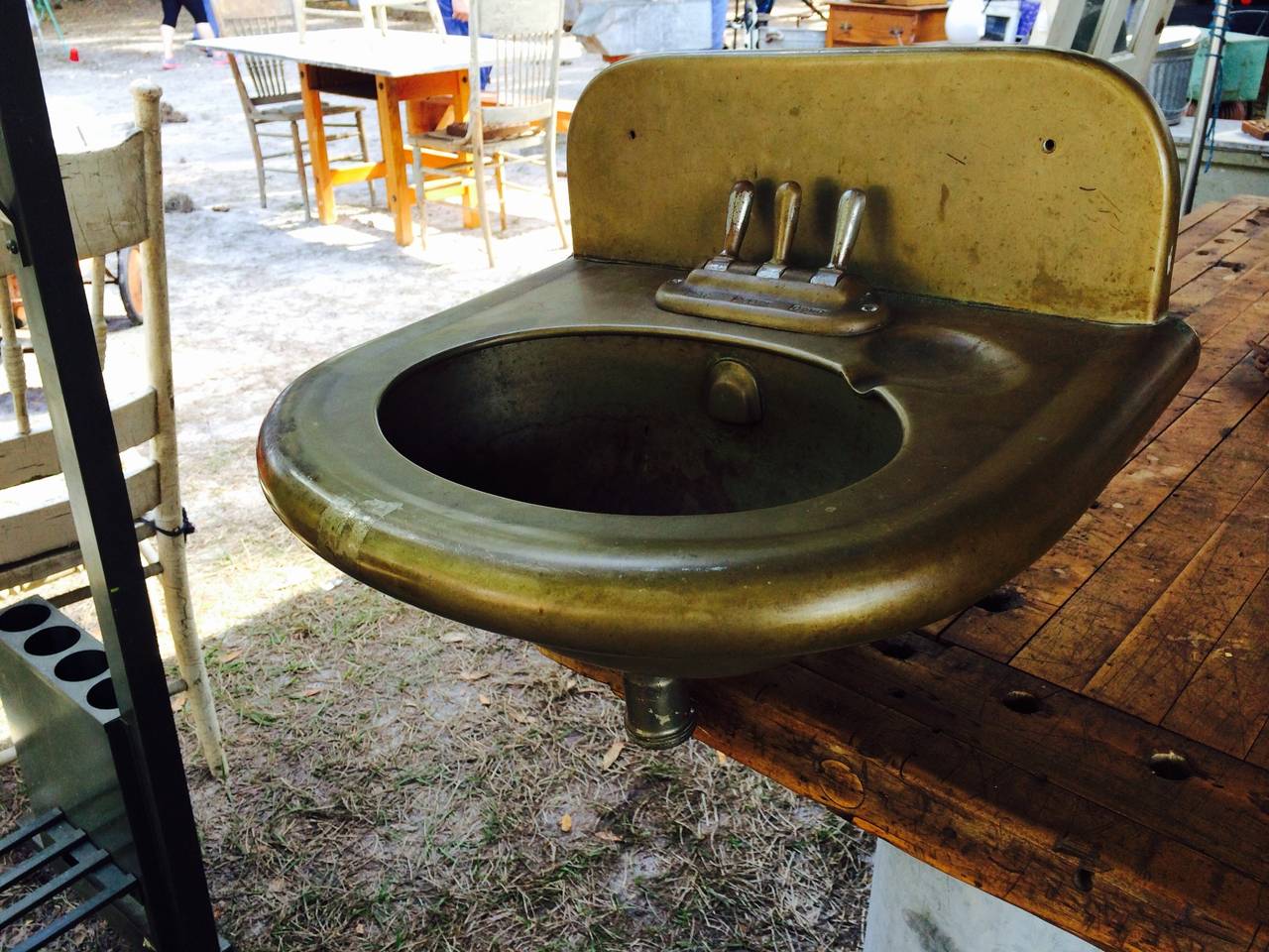 Railroad car, solid brass sink, circa 1910. Fully functional sink sized small to fit a railroad sleeper car. Beautiful piece of railroad memorabilia that still functions nicely for small bathroom, washroom, potting shed, planter. Feeder pipes are in