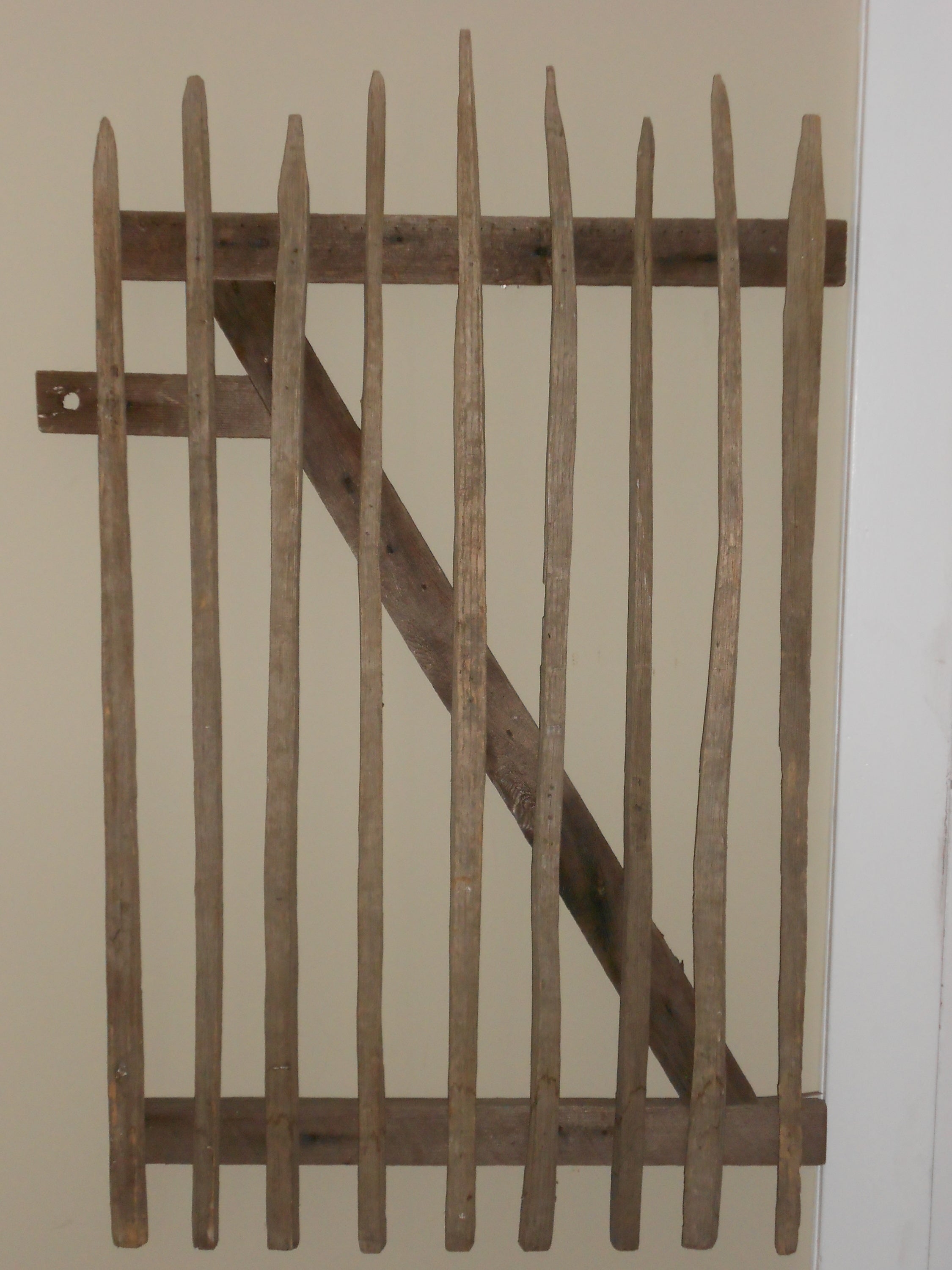 Primitive Garden Gate of hand-hewn stakes