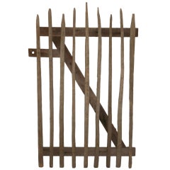 Primitive Garden Gate of hand-hewn stakes