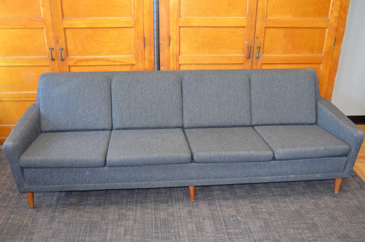 Mid-century Folke Ohlsson designed for Dux sofa and produced for Povl Dinesen in the early 1960s with original tattersall wool fabric with original Dux label. Fabric does show some age. The pattern is an alternating check of a lighter slate gray