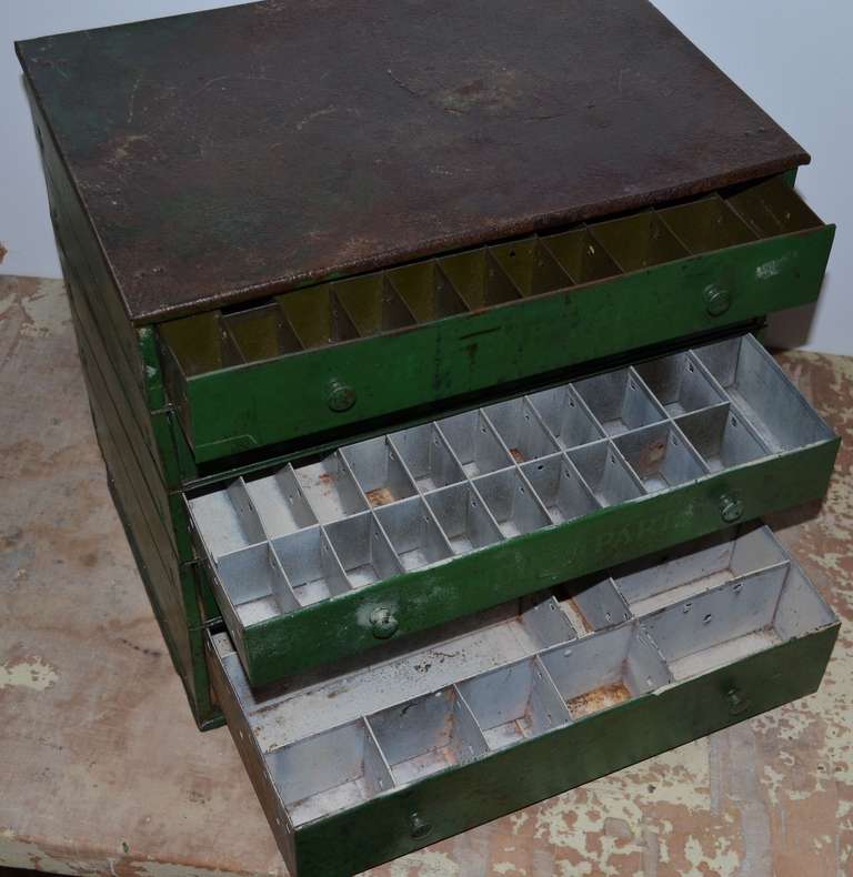 20th Century Mid-century industrial cabinet of steel in as-found green paint.