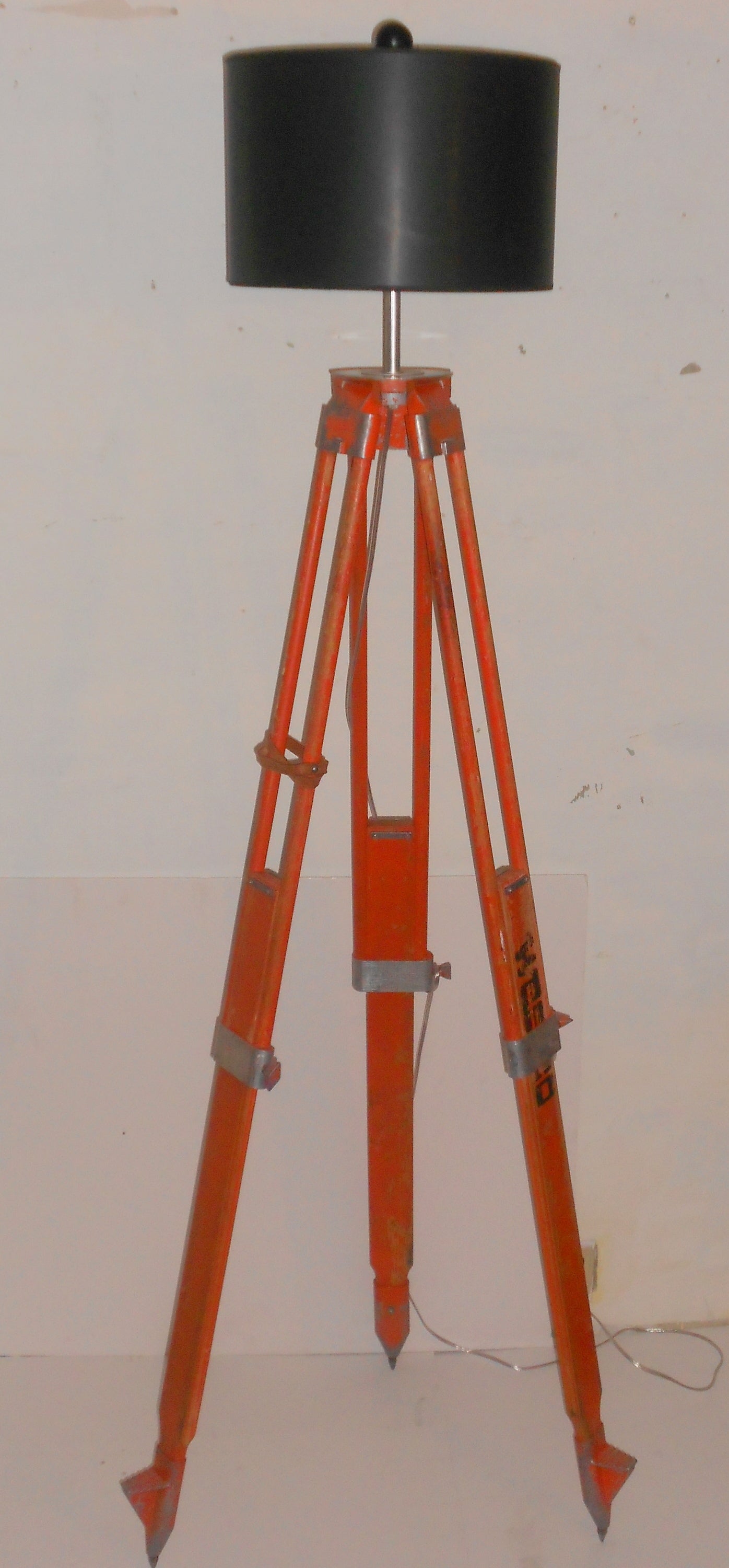 Floor lamp from adjustable surveyor's tripod