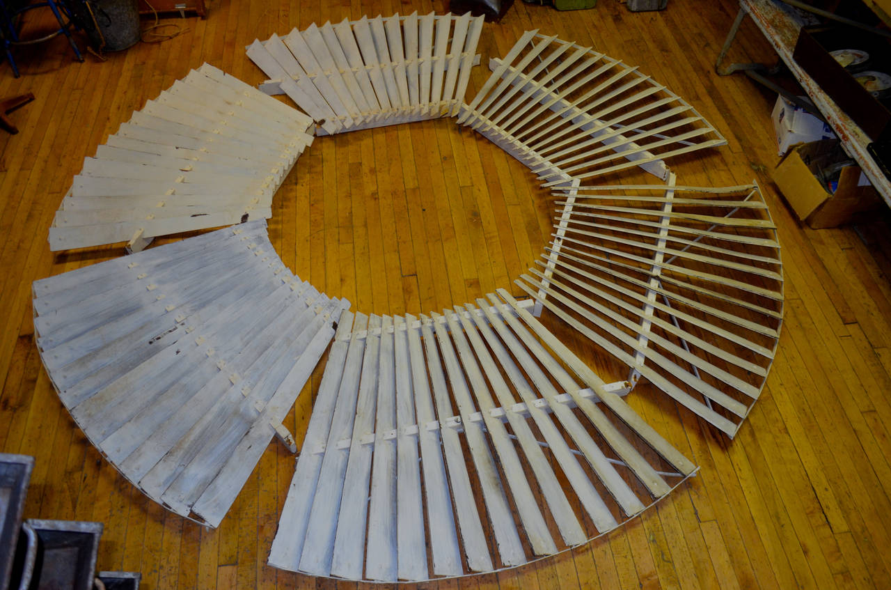Late 1800s midwestern wooden farm windmill spans a diameter of 10 feet. It is rare to find a wooden windmill of this age ins such excellent working condition. Windmill is in six segments and does not include hardware to attach them to each other.