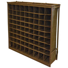 Military Field Postal Unit of Canvas Cubbies Framed by Steel Rods