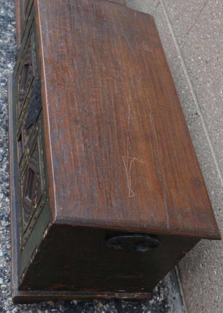 Antique trunk with detailed carvings.