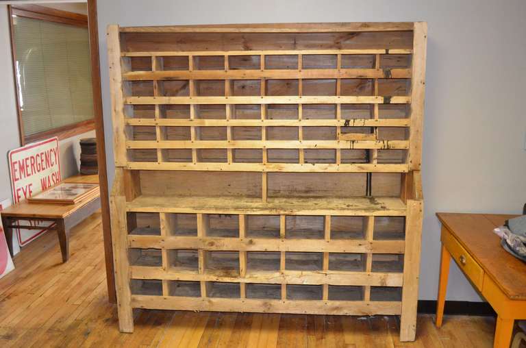 Storage cabinet hand-built from pine and fir. With 61 cubbies of two different sizes, this cabinet provides extensive and varied storage. Over six feet tall and six feet wide, this is a significant piece of furniture for shop, garage or home. Built