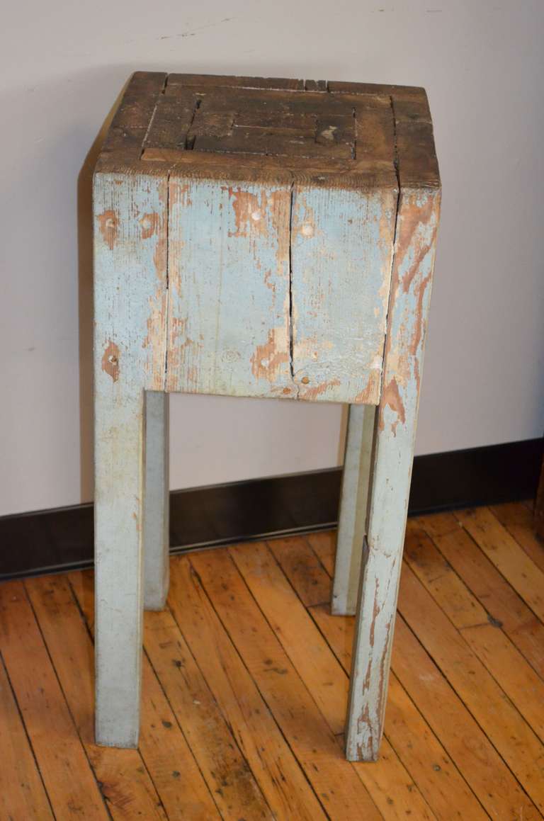 Hand-crafted butcher block with original soft blue paint and cross-patched top. An agrarian artifact from the 19th century. Makes a striking end table, corner table, perfect for the perching of a lamp, vase of flowers, smallish sculpture. Sturdy,