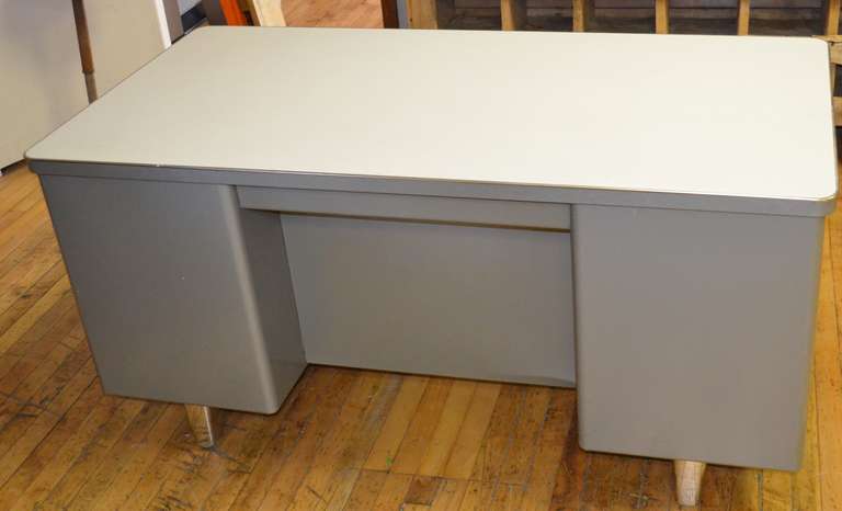 Mid-century Invincible Office Desk in classic gray and excellent condition. The line of 
